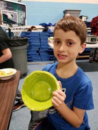 boy with an empty bowl